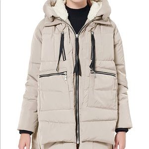 “Amazon coat” in cream
